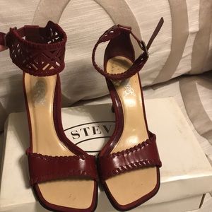 Carlos Santana burgundy heels.
